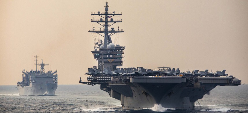 Components of the Dwight D. Eisenhower Strike Group transit the Strait of Hormuz, Dec 14, 2023.