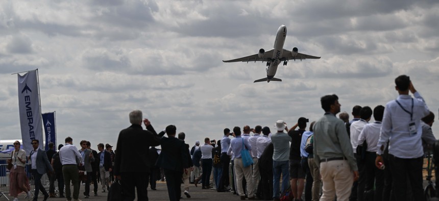 An Airbus A350-1000 aircraft performs a flight demonstration during the second day of the Farnborough International Airshow in Farnborough, United Kingdom, on July 21, 2026