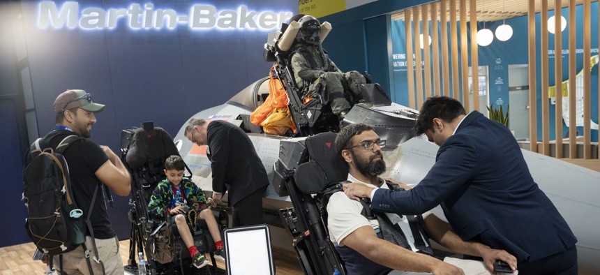 Visitors tried out Martin-Baker's ejection seats at the 2024 Farnborough International Airshow in Farnborough, England. 