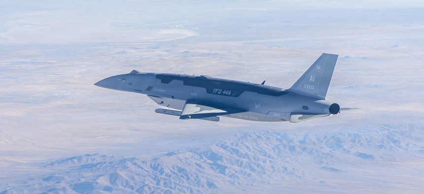 A YFQ-44A Collaborative Combat Aircraft flies over the Mojave Desert after conducting live-fire testing over the Mojave Desert in January 2026.