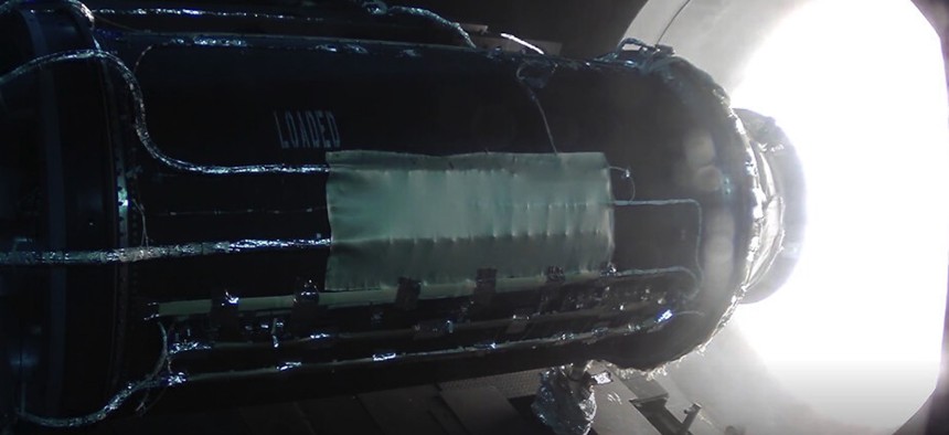 The rocket motor built by L3Harris Technologies for Lockheed Martin's Next Generation Interceptor undergoes a static test-firing.