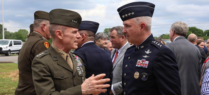 Gen. Stephen Whiting, commander of U.S. Space Command, speaks with Lt. Gen. James Adams, director of the Defense Intelligence Agency, during a ribbon-cutting ceremony at Redstone Arsenal, Alabama, April 29, 2026.