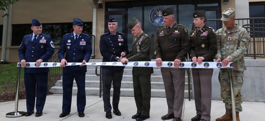 Gen. Stephen Whiting, commander of U.S. Space Command, and Lt. Gen. James Adams, director of the Defense Intelligence Agency, cut the ribbon at ceremony on Redstone Arsenal, Alabama, April 29, 2026.