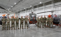 Army aviation students who are slated to participate in a contractor owned and operated Flight School Next pilot program, gather for a photo at Fort Novosel, Ala., March 28, 2025.
