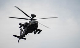 An AH-64 Apache Attack Helicopter in flight during an aviation gunnery exercise on Fort Hood, Texas, March 31, 2026.