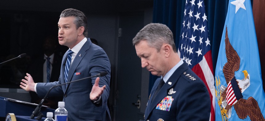 Defense Secretary Pete Hegseth speaks alongside Chairman of the Joint Chiefs of Staff Gen. Dan Caine during a press briefing at the Pentagon on April 16, 2026.
