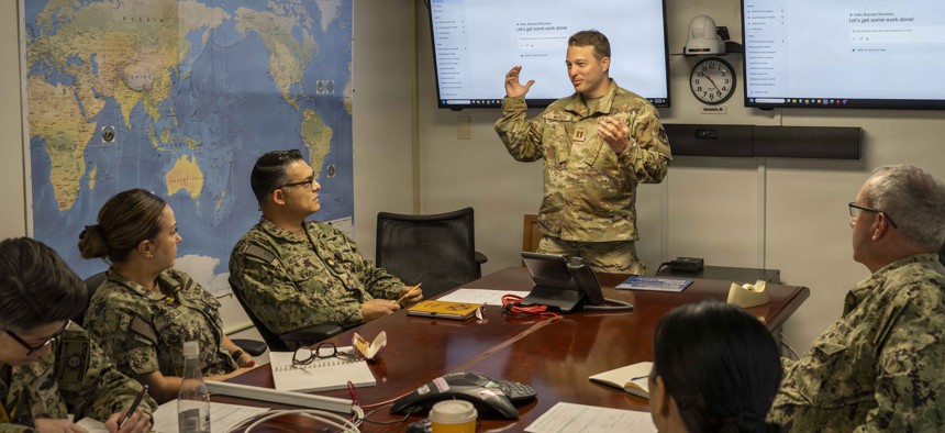 A U.S. Air Force captain from the Pentagon's Chief Digital and Artificial Intelligence Office delivers training on building AI agents to sailors at U.S. Pacific Fleet on Joint Base Pearl Harbor-Hickam, Hawaii, on July 21, 2026.