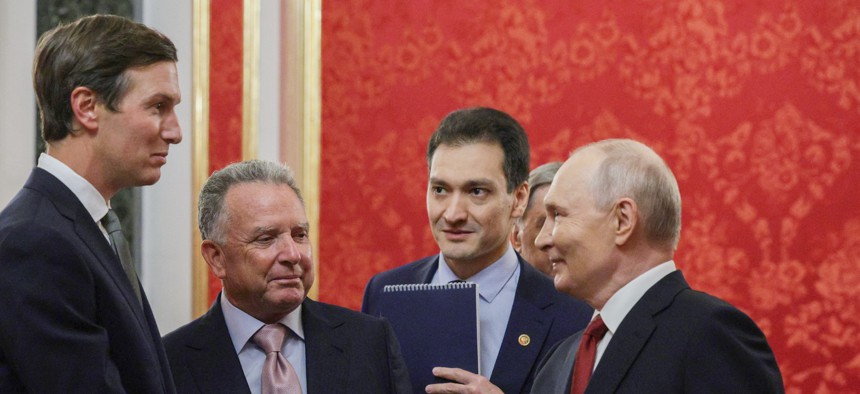 In this pool photograph distributed by the Russian state agency Sputnik, Russia's President Vladimir Putin (R) welcomes U.S. special envoy Steve Witkoff and U.S. President Donald Trump's son-in-law Jared Kushner prior to their talks in Moscow on September 5, 2026.