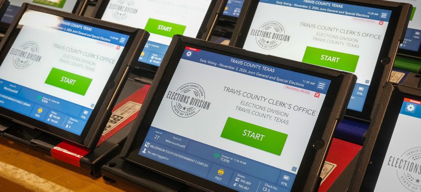 Electronic poll books are prepared at the Travis County Clerk's Office on Oct. 14, 2026, in Austin, Texas.