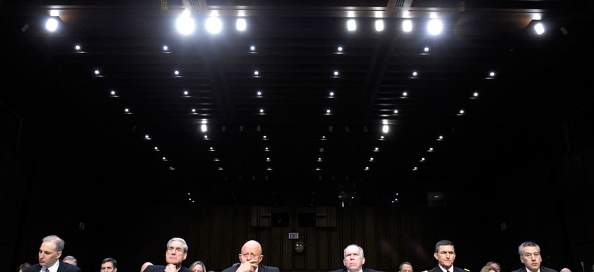 A Senate Intelligence Committee hearing features Defense Intelligence Agency Director Lt. Gen. Michael Flynn and CIA Director John Brennan.