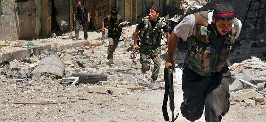 Syrian rebels clash with soldiers loyal to president Bashar Assad in Aleppo