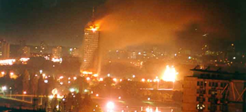 A building on fire after a NATO bombing run in the former Yugoslavia