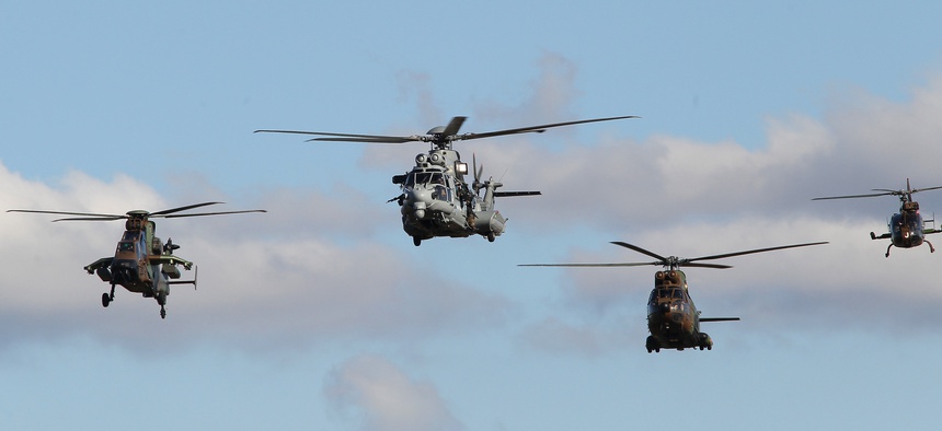 French military helicopters showing off the weapons used to fight former Libyan dictator Muammar Qaddafi