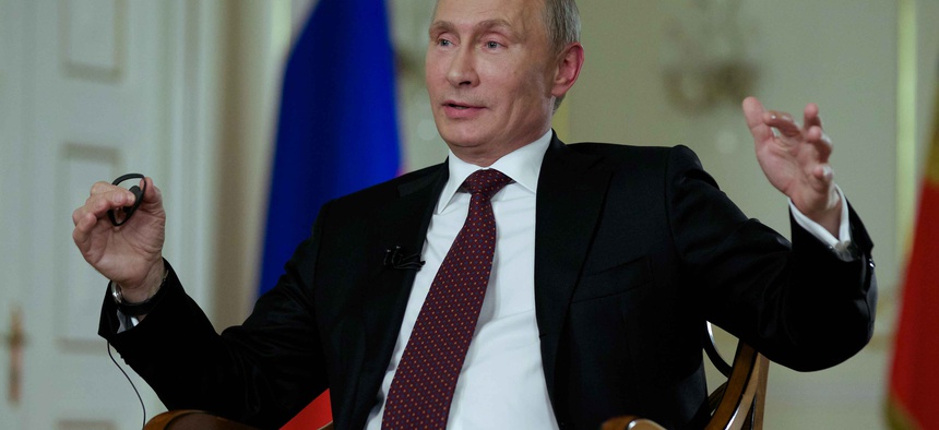 Russian President Vladimir Putin speaking to a reporter during an interview in Moscow