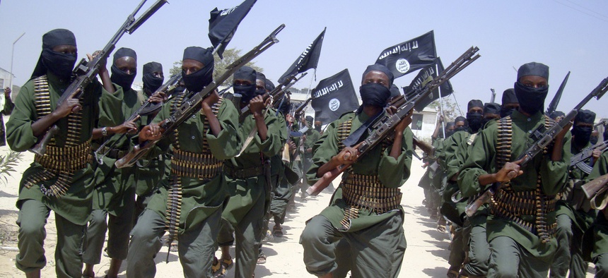 Al-Shabab fighters march during military exercises outside Mogadishu, Somalia, in 2011.