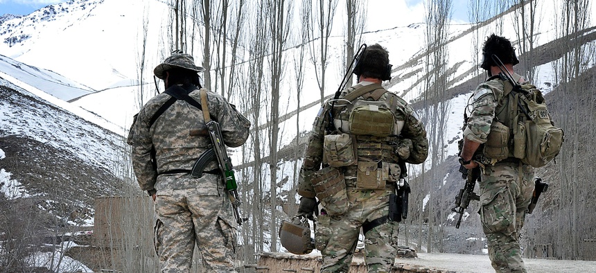 A group of Special Forces scan a valley in the Uruzgan province, Afghanistan. The number of special forces is set to increase in the Pentagon's proposed budget