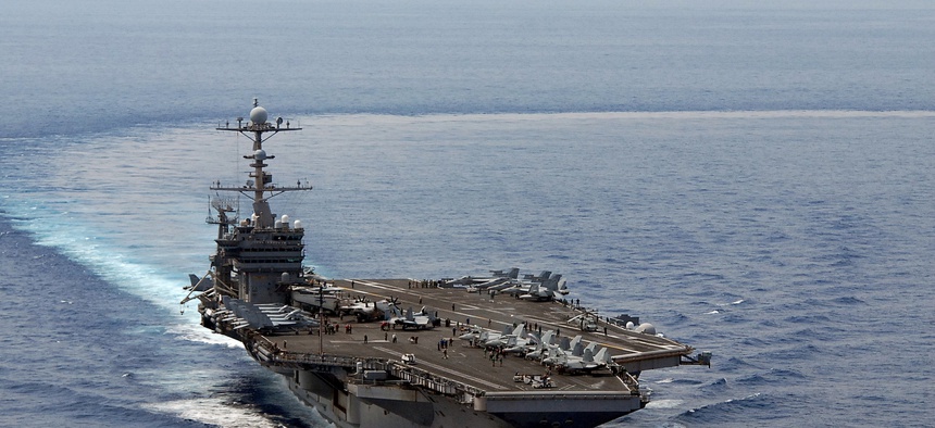 The USS George Washington, the carrier that could face the chopping block if further defense budget cuts come into place