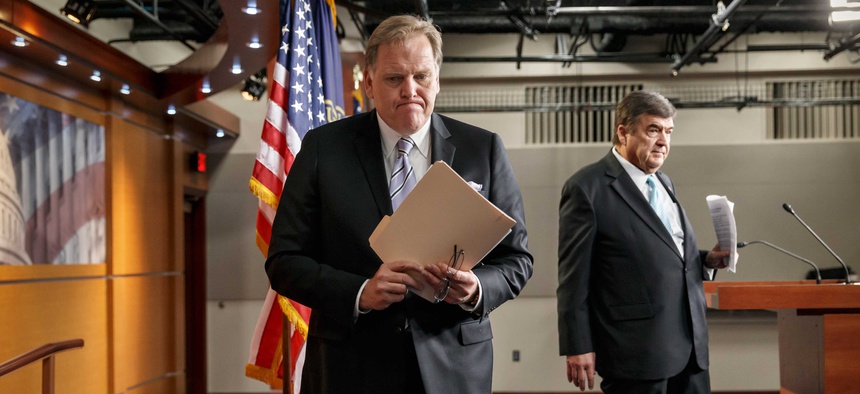 Reps. Mike Rogers, R-Mich., and Dutch Ruppersberger, D-Md., after presenting their changes to the NSA's surveillance program