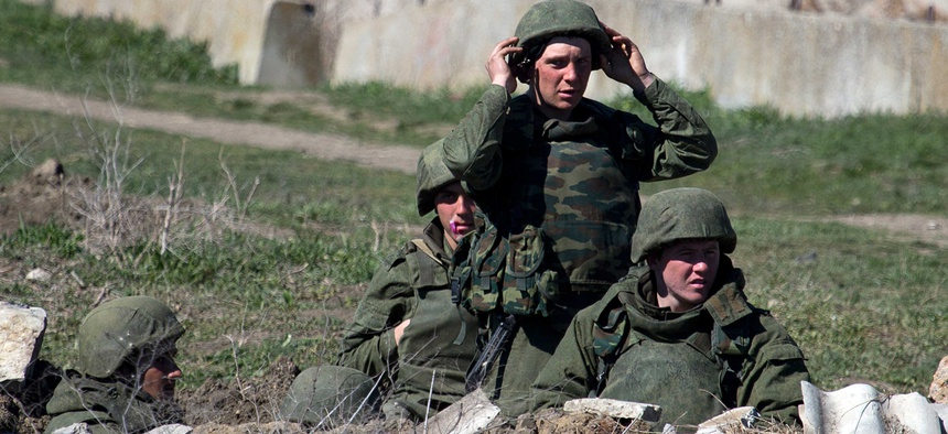 Pro-Russian troops standing in position in Feodosia, Crimea.
