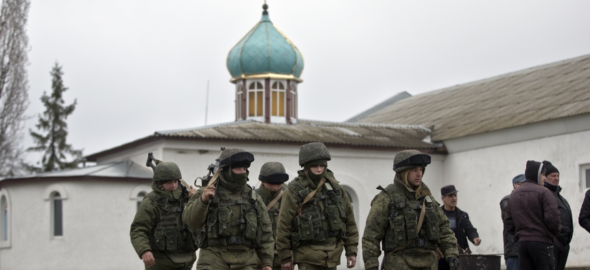Pro-Russian troops marching in Crimea