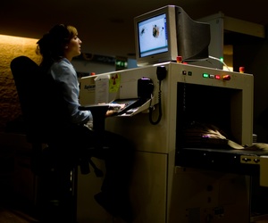 Passengers have their luggage screened by security personnel inside the Ben Gurion airport terminal near Tel Aviv, Israel, November 2010. Passengers have their luggage screened by security personnel inside the Ben Gurion airport terminal near Tel Aviv, Israel, November 2010.