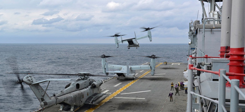 A group of MV-22 Ospreys taking off from the USS Bonhomme Richard during operations in the East China Sea