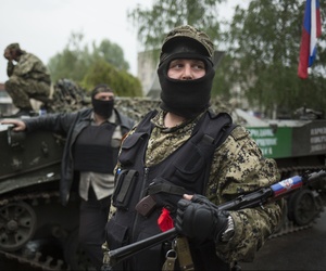Pro-Russian gunmen guard the central square of Slovyansk, eastern Ukraine, Friday, May 2, 2014. Pro-Russian gunmen guard the central square of Slovyansk, eastern Ukraine, Friday, May 2, 2014.