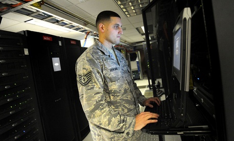 A non-commissioned officer with the 627th Communications Squadron works on a computer system at Joint Base Lewis-McChord in Washington A non-commissioned officer with the 627th Communications Squadron works on a computer system at Joint Base Lewis-McChord in Washington