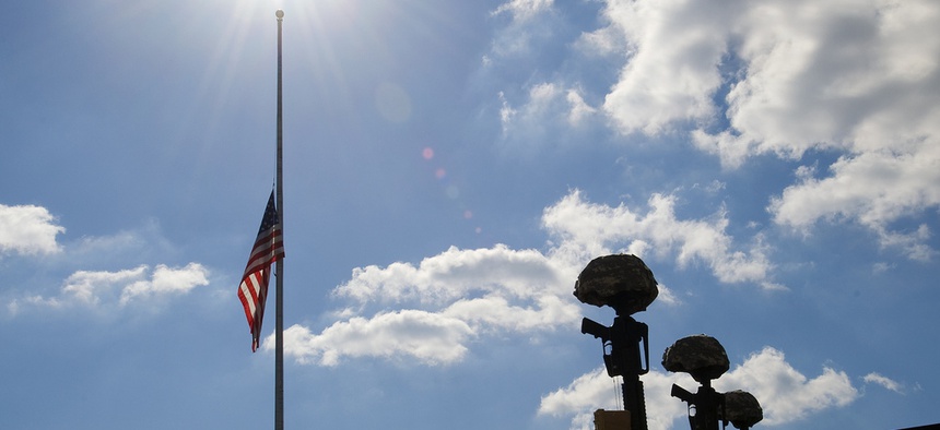 A flag at Fort Hood rests at half mast during a memorial ceremony honoring the victims of the November 5, 2009 shooting