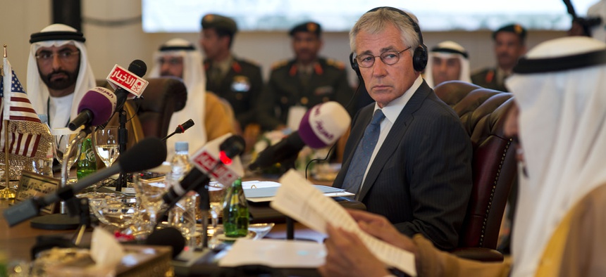 Defense Secretary Chuck Hagel listens to his Saudi counterpart Salman bin Abdulaziz Al Saud at the Gulf Cooperation Council Defense Ministerial in Jeddah, Saudi Arabia, May 14, 2014.