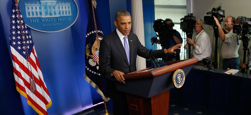 President Obama speaks to reporters about the burgeoning scandal at the Veterans Affairs Department on May 21, 2014.