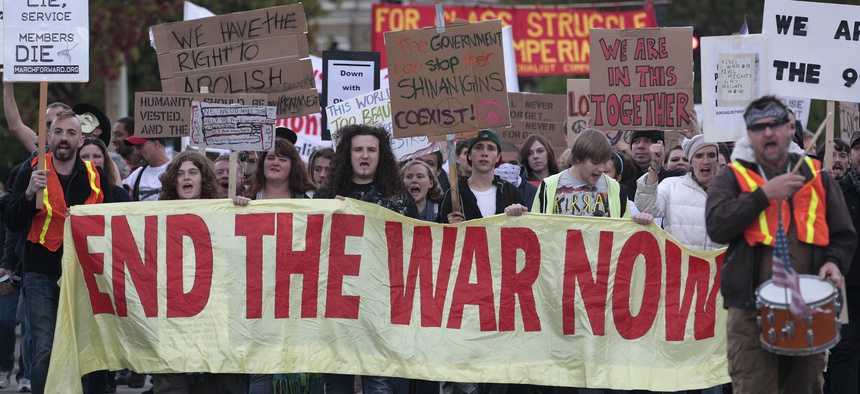 Several hundred demonstrators march in downtown Seattle to protest the war in Afghanistan in October 2011 ahead of the 10-year anniversary of the start of the war.