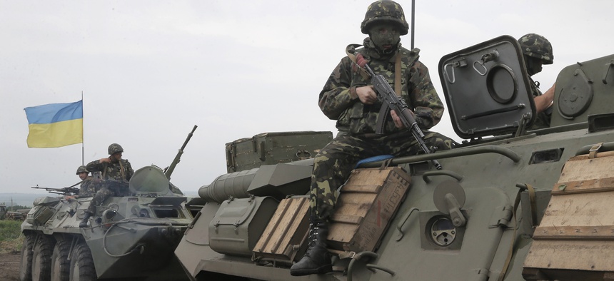 Ukrainian army paratroopers move to position in Slovyansk, Ukraine, on Saturday.