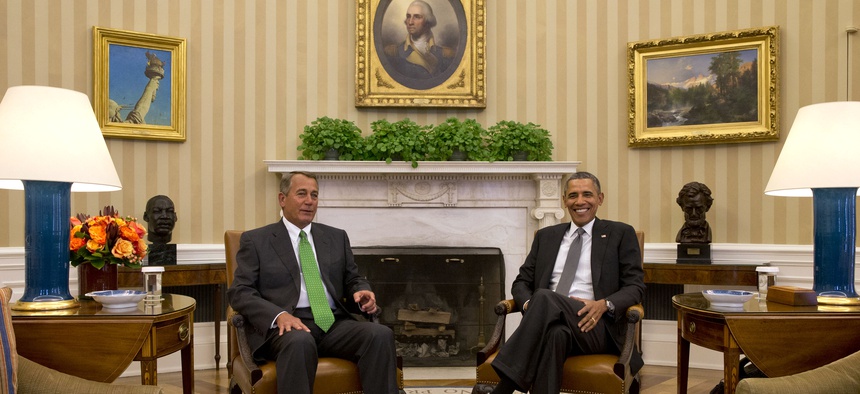 President Obama meets with House Speaker John Boehner in the Oval Office on February 25, 2014.