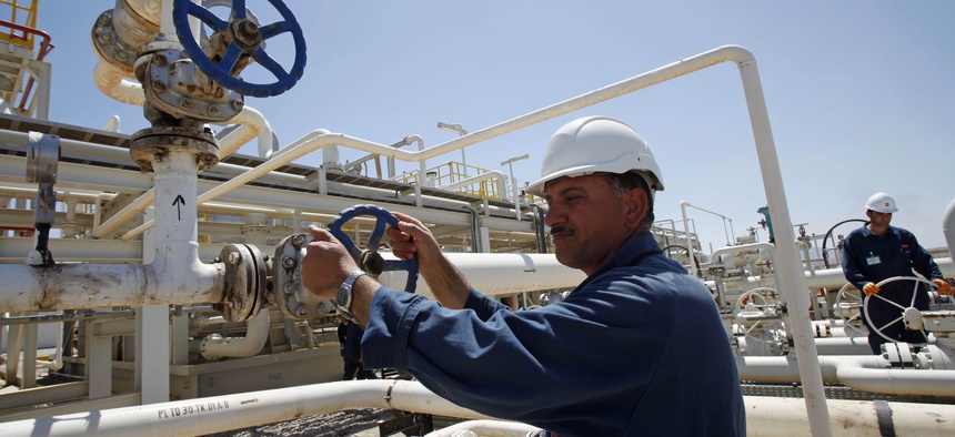 An employee works at the Tawke oil field in the Kurdish region in northern Iraq, on May 31, 2009.
