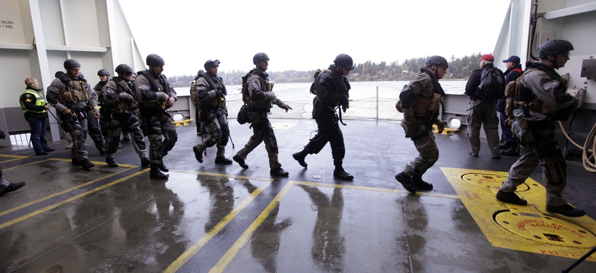 SWAT team members undertake training exercises on a Washington State ferry near, on October 29, 2012.