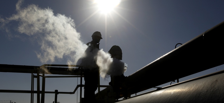 A Libyan oil worker works at a refinery inside the Brega oil complex in eastern Libya, on April 6, 2014.