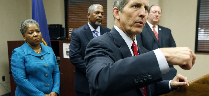 Acting Secretary of Veterans Affairs Sloan Gibson responds to reporters questions about improvements within the system, on July 11, 2014.