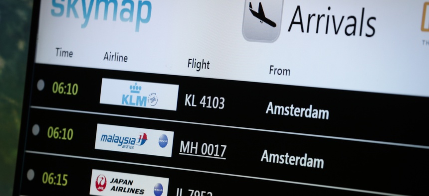 An electronic flight information board at Kuala Lumpur International Airport in Sepang, Malaysia, shows information on Malaysia Airlines Flight 17, on July 18, 2014.