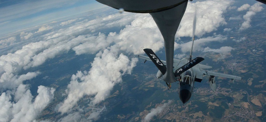 A KC-135 from RAF Mildenhall, England, refuels a German Tornado jet over Germany, on June 24, 2014.