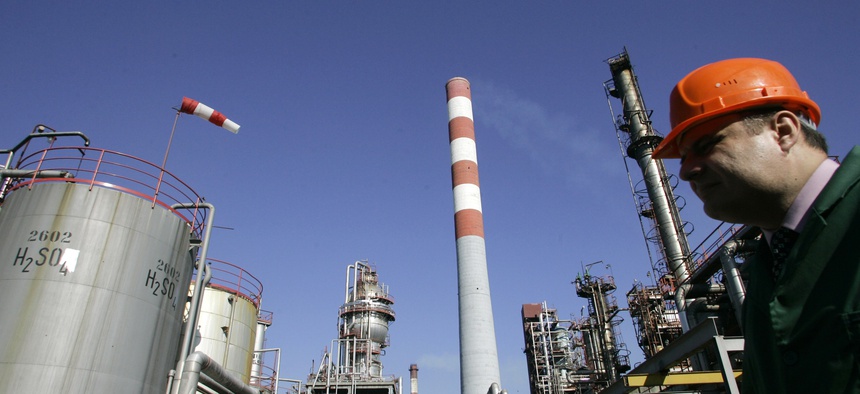 A worker at the NIS Jugopetrol oil refinery prior to a visit by Russian prime minister Dmitry Medvedev.