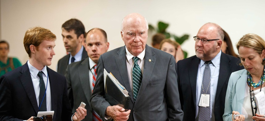 Senate Judiciary Committee Chairman Sen. Patrick Leahy walks to a closed door briefing on Capitol Hill.