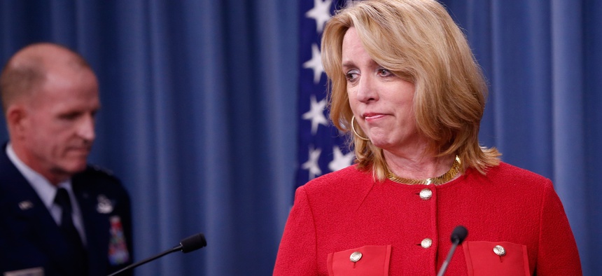 Air Force Secretary Deborah Lee James, followed by Air Force Global Strike Command (AFGSC) Commander Lt. Gen. Stephen Wilson, arrives for a news conference at the Pentagon, March 27, 2014.