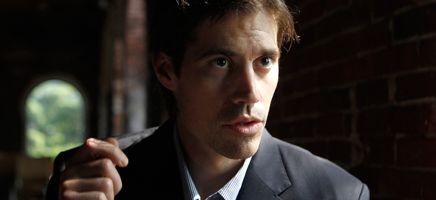 Journalist James Foley, of Rochester, N.H., responds to questions during an interview with The Associated Press, in Boston, May 27, 2011.