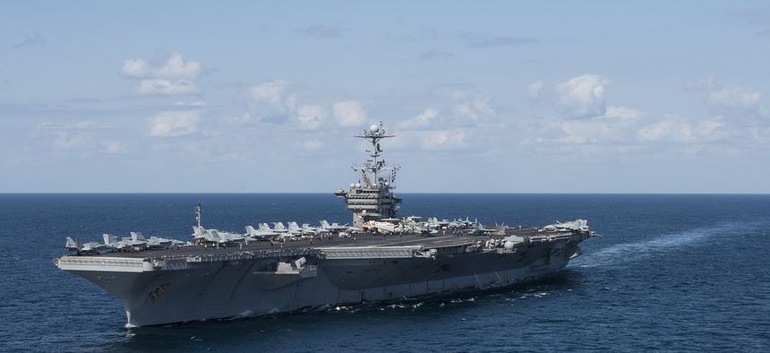 The Nimitz Class aircraft carrier USS Harry S. Truman transits the Gulf of Oman.