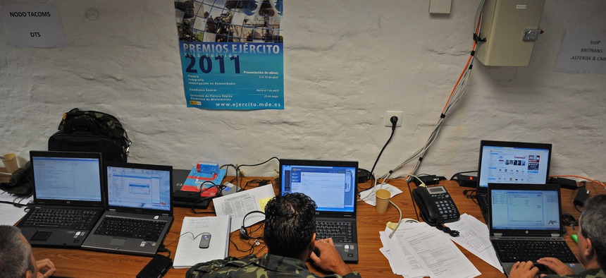 Members of the Ukraine military monitor and maintain a network during the exercise Combined Endeavor 2011 in Grafenwoehr, Germany.