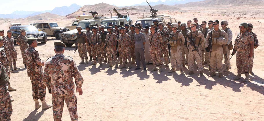 Jordanian Armed Forces Brigadier Gen. Ya'agoub Ajarmah congratulations Marines and members of Jordan's Armed forces for a border security exercise as part of Eager Lion 2014.
