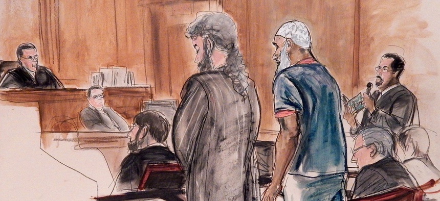 In this courtroom illustration, Sulaiman Abu Ghaith, center right, stands next to his attorney during his sentencing hearing in New York, on September 23, 2014.