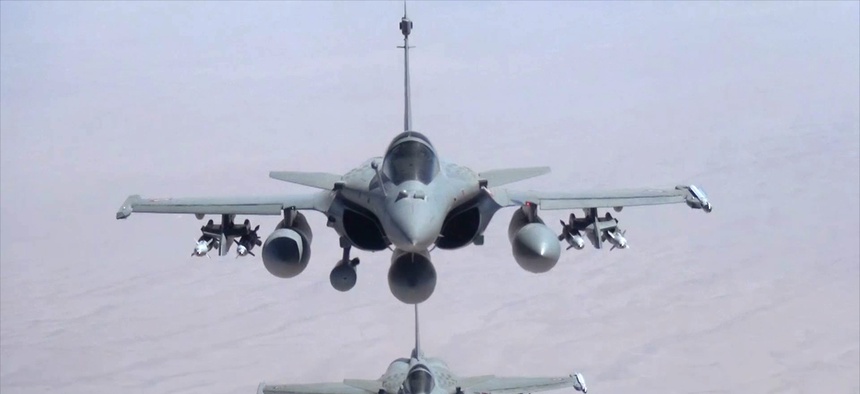 A screen shot from a video published by the French military showing the two Rafale jet fighters in the sky over Iraq during an operation.