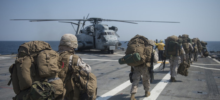 Marines assigned to the 31st Marine Expeditionary Unit load onto a CH-53E Super Stallion during Exercise Ssang Yong, on April 2, 2014.